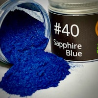 a jar of blue powder with the words 40 sapphire blue