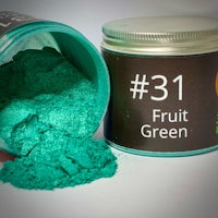 a jar of green powder with the label 31 fruit green