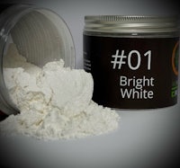 a jar of bright white powder next to it